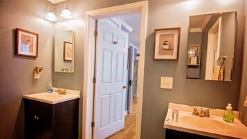 Combined shower/tub, hair dryer, towels, soap