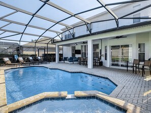 A heated pool, pool loungers