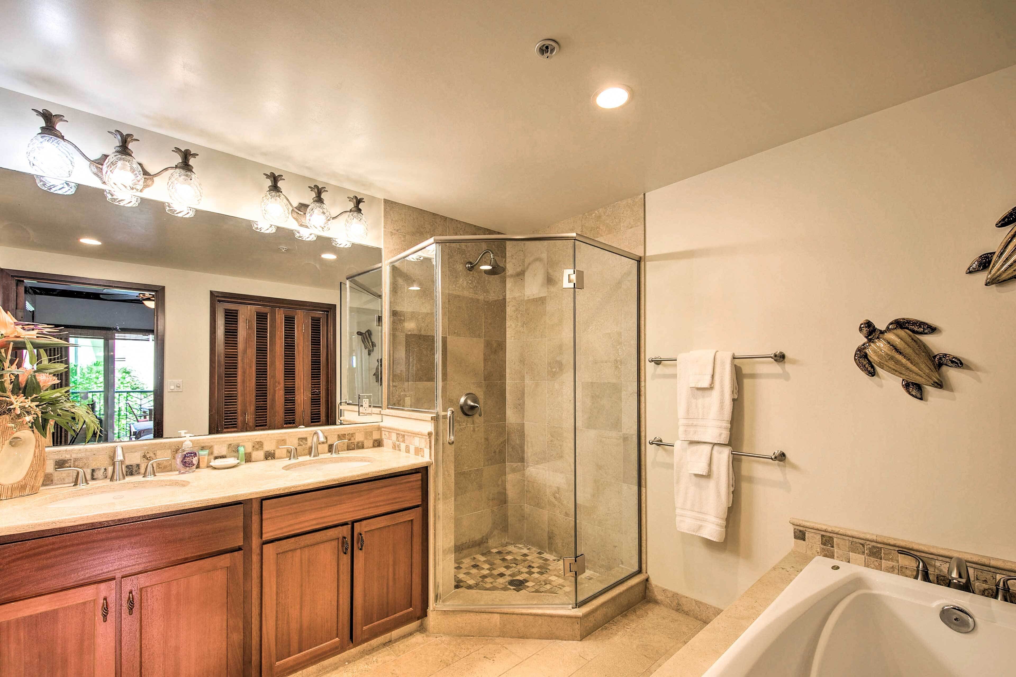 Bathtub, hair dryer, towels, soap