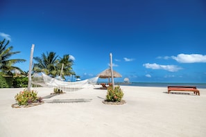 On the beach, sun-loungers, beach towels