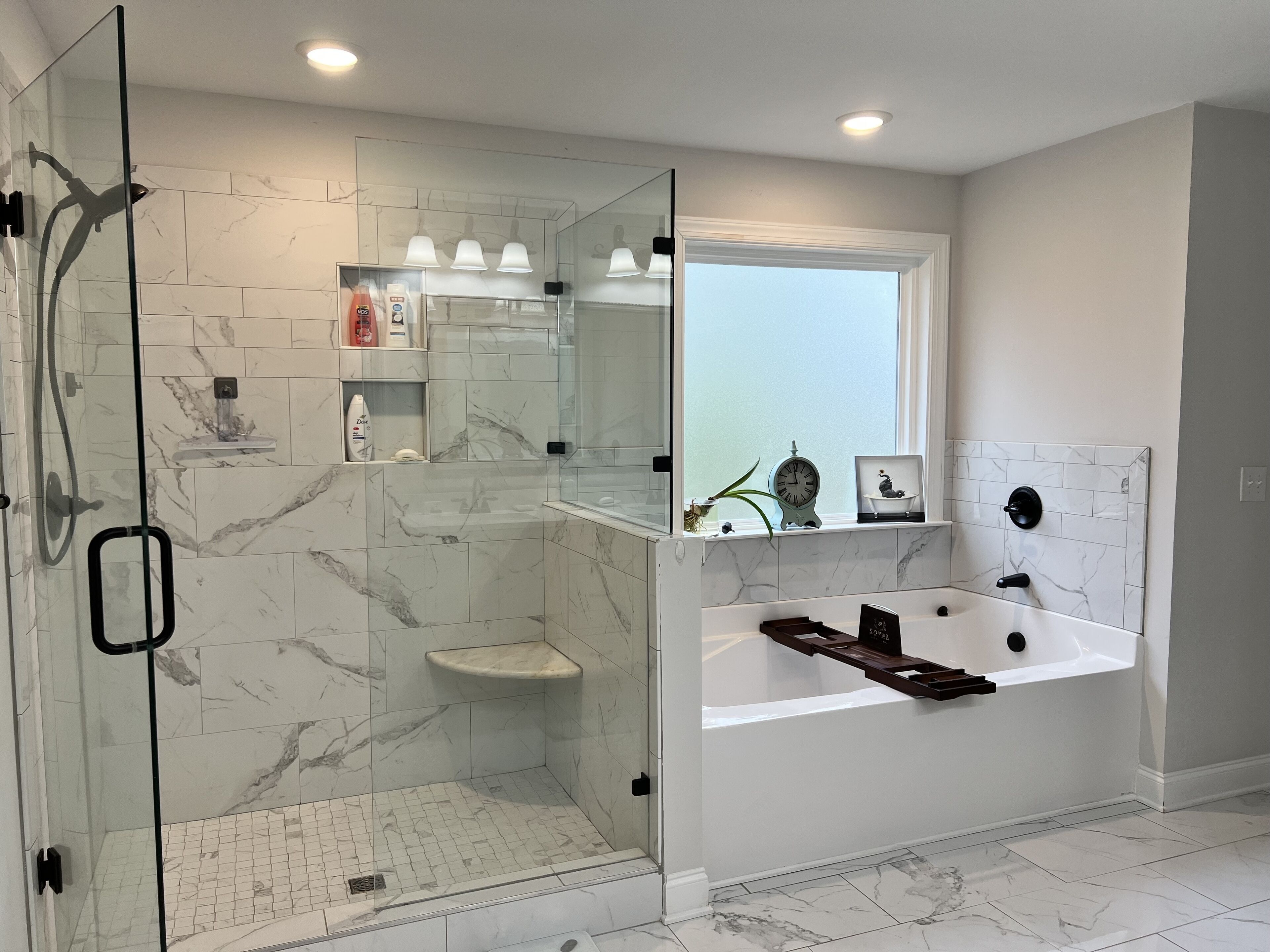 Combined shower/bathtub, hair dryer, towels, soap