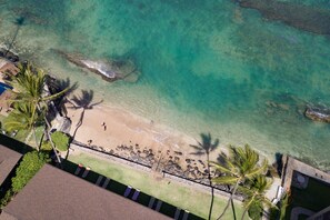 On the beach, sun loungers, beach towels