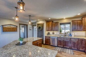 Fridge, microwave, oven, stovetop - Annie Creek Lodge – Hot tub, game loft, fireplaces & stunning views! (Lead)