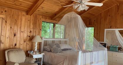 Lakefront cabin with spectacular sunsets included