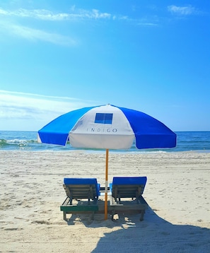 On the beach, sun loungers