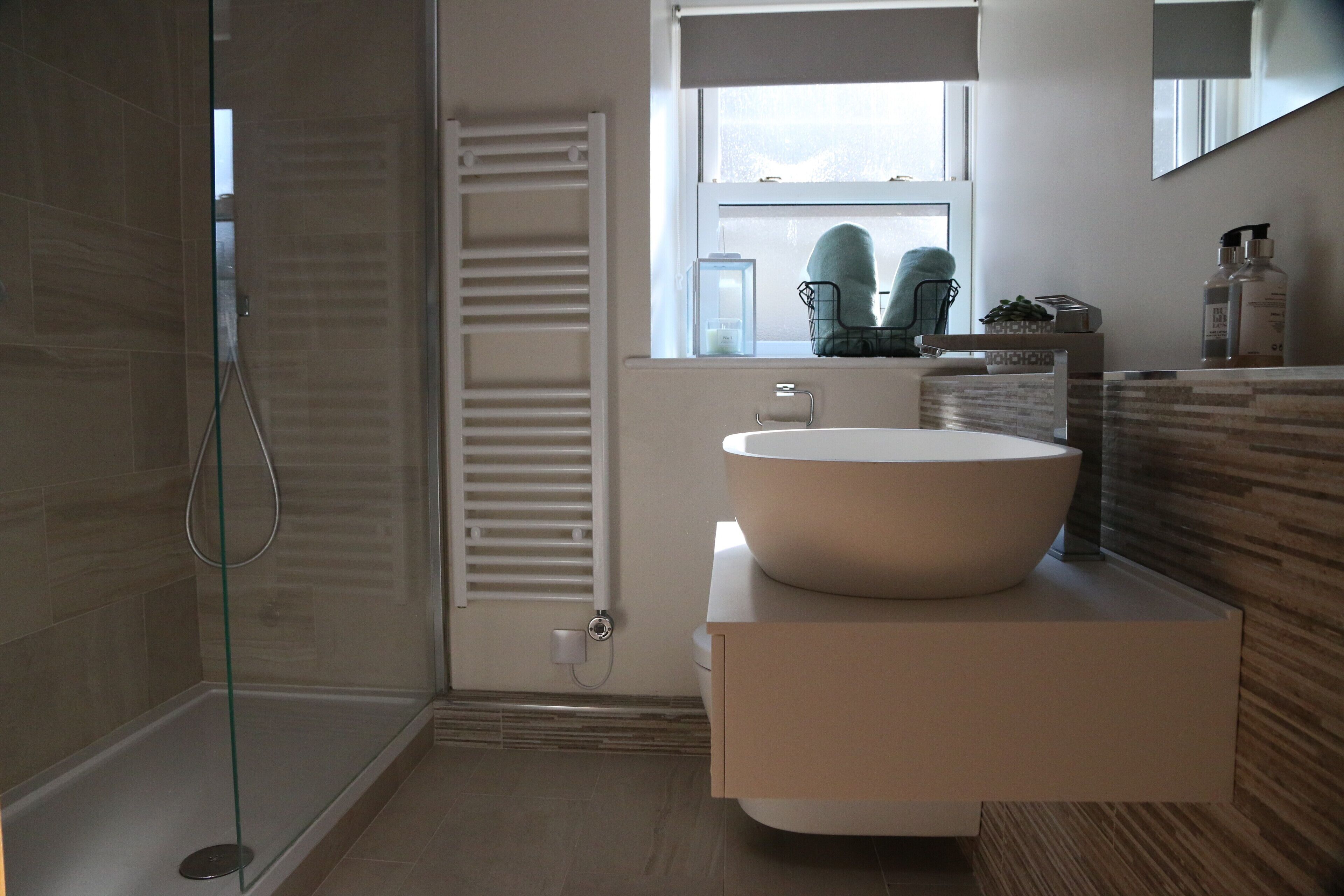 Shower, hair dryer, towels, toilet paper