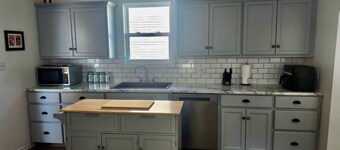 Lovely home close to the bike trails, the Magdalen ferry, and Basin Head beach!
