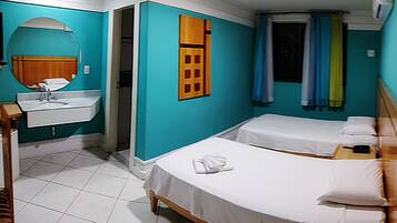 Twin Room | Minibar, desk, laptop workspace, blackout drapes