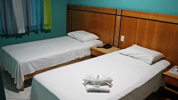 Economy Room | Minibar, desk, laptop workspace, blackout drapes