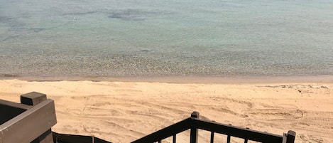 On the beach, sun-loungers, beach towels