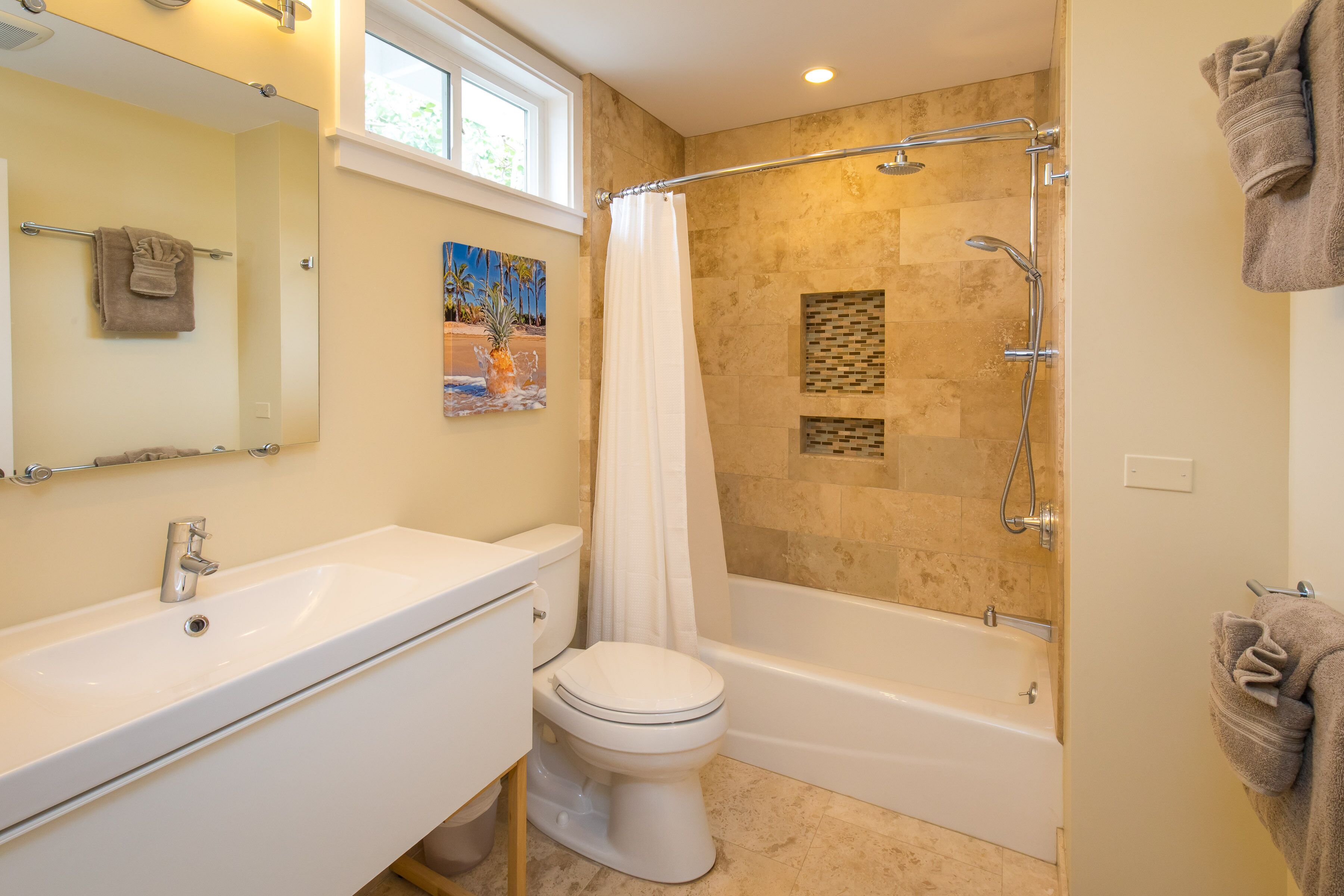 Combined shower/tub, hair dryer, towels, soap