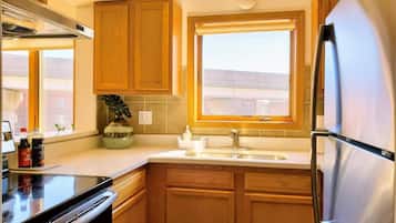 Fridge, microwave, coffee/tea maker, dining tables