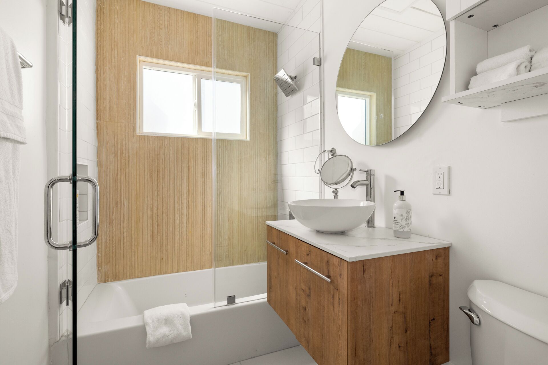 Bathtub, hair dryer, towels, soap