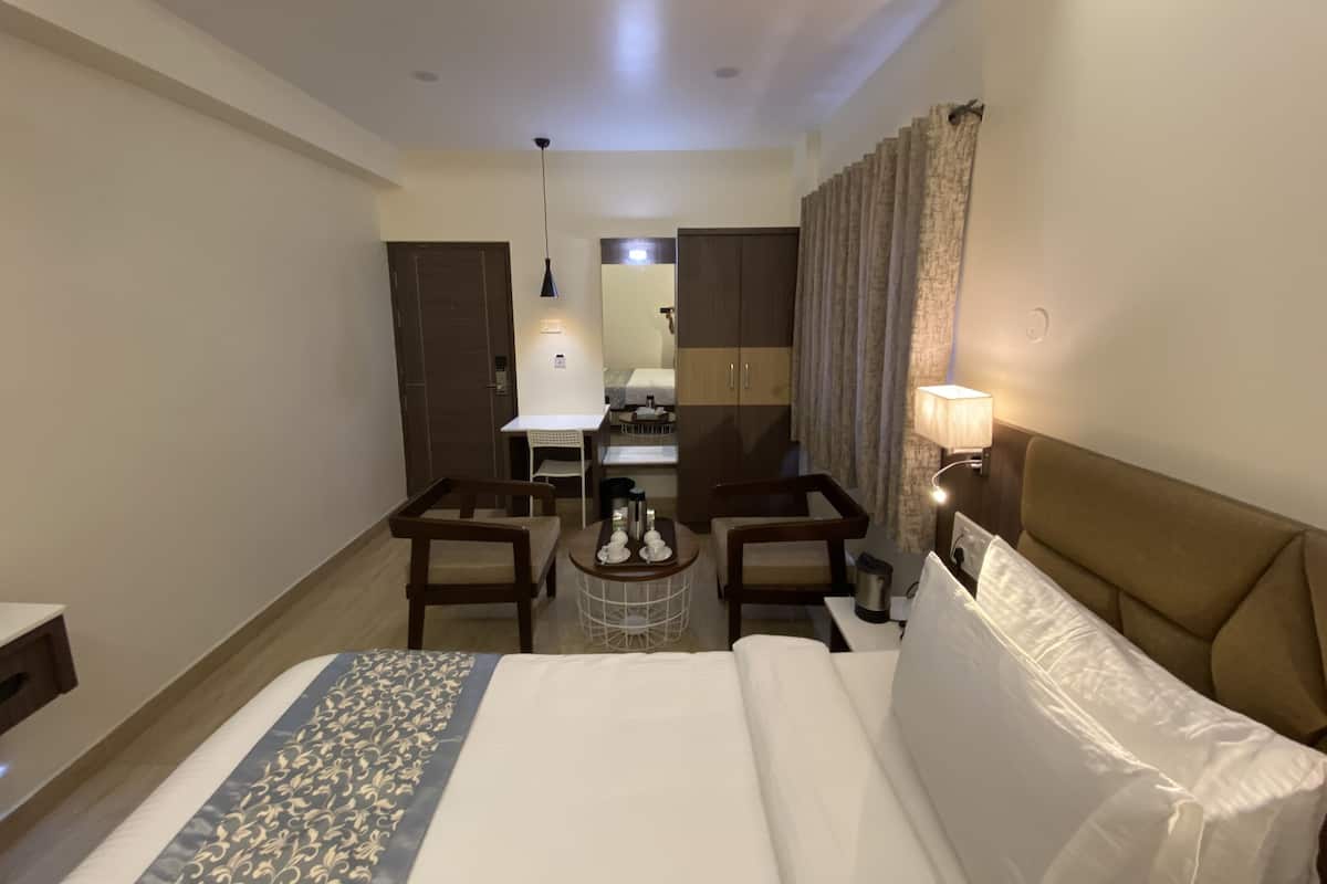 Habitación doble ejecutiva | Ropa de cama de alta calidad, edredón, camas con pillow-top y minibar 