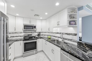 Fridge, microwave, oven, stovetop - Beachfront condo w/ views, pool & tennis courts (Marco Island)