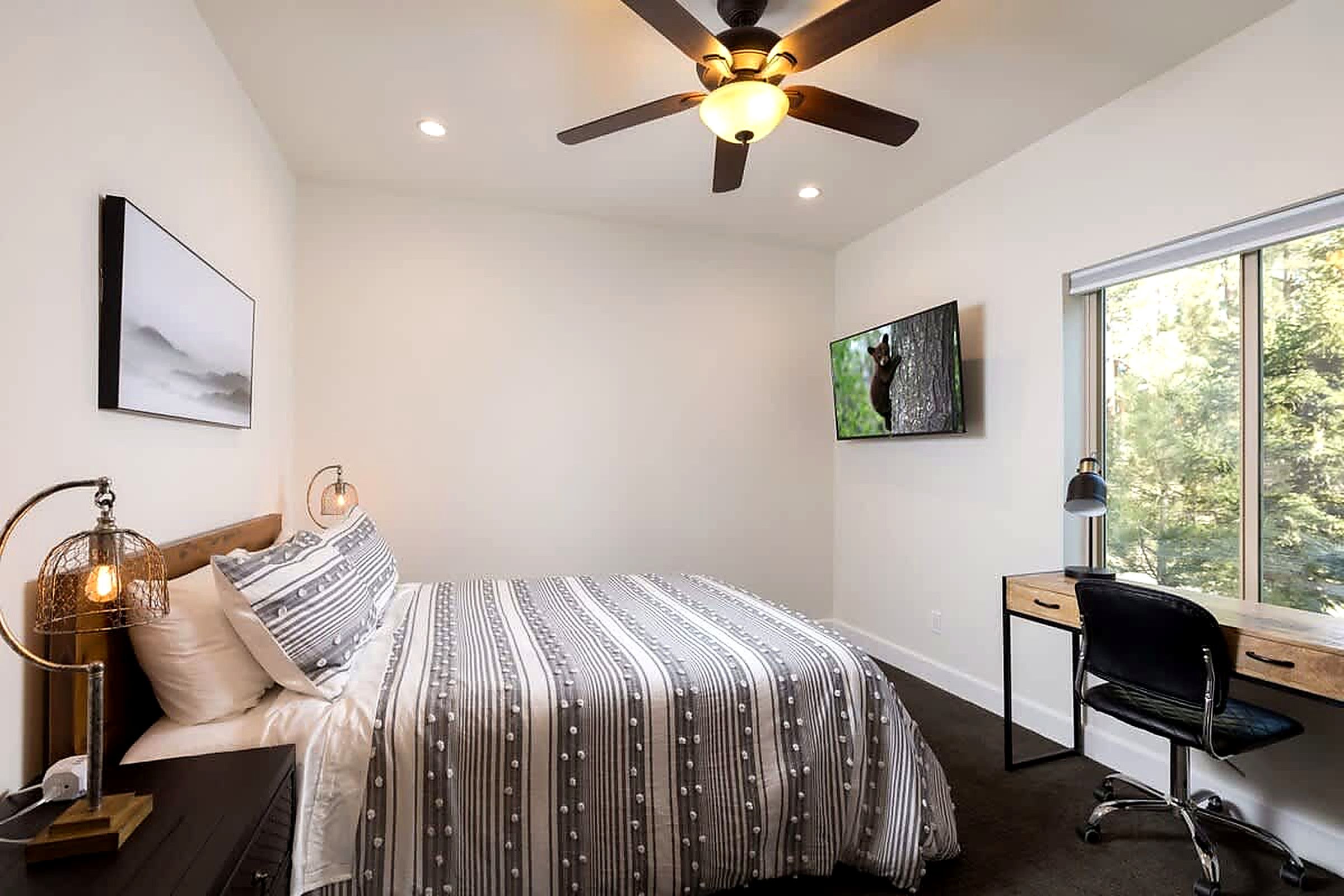 3rd bedroom upstairs with LCD TV and Desk