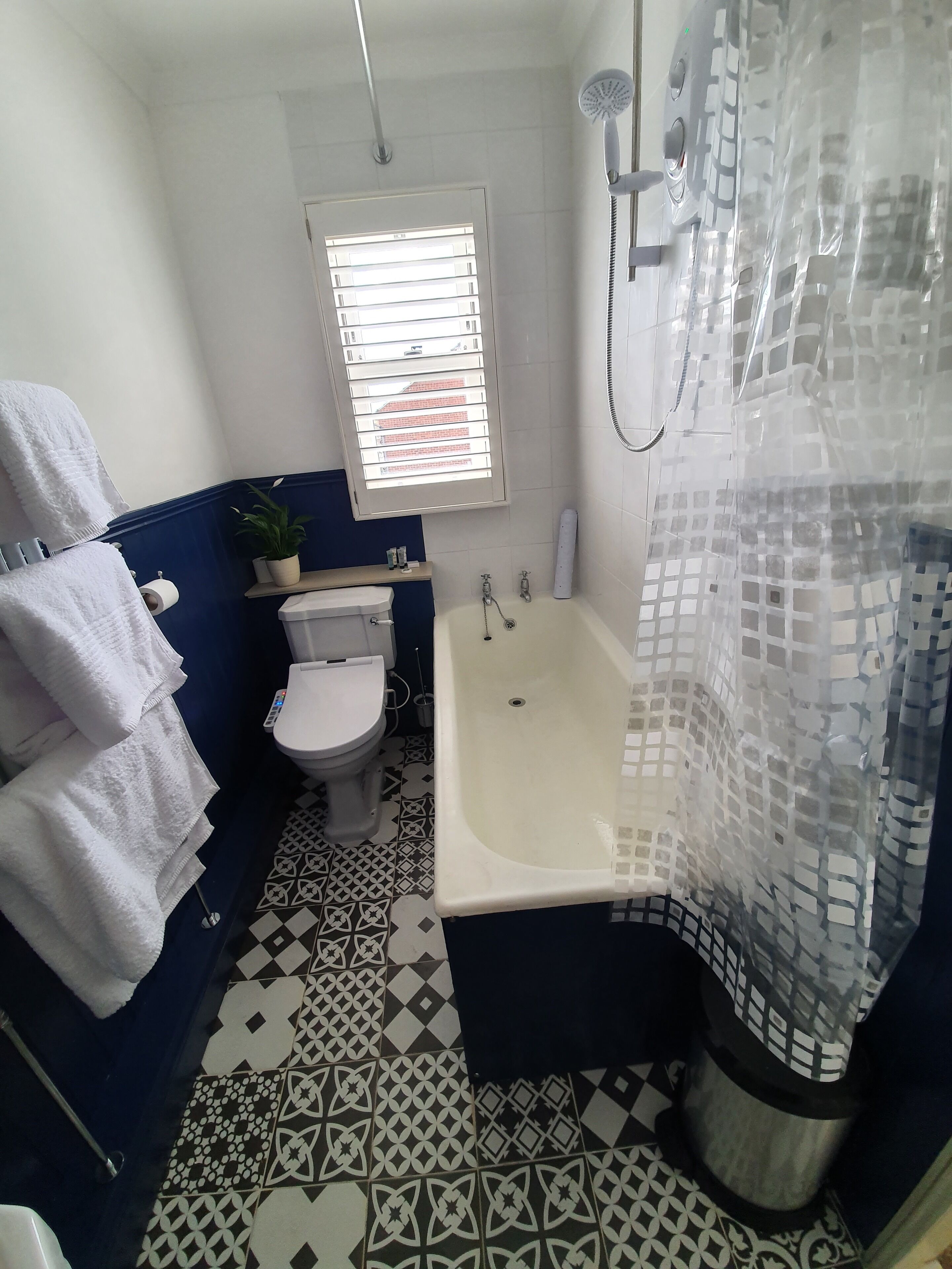 Hair dryer, towels, soap, toilet paper