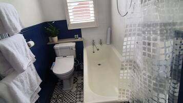 Hair dryer, towels, soap, toilet paper