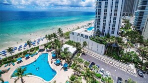 A hotel with a pool, beach, and ocean view. - Beach Front Spacious 1BR , The Tides, Hollywood,FL (Hollywood)
