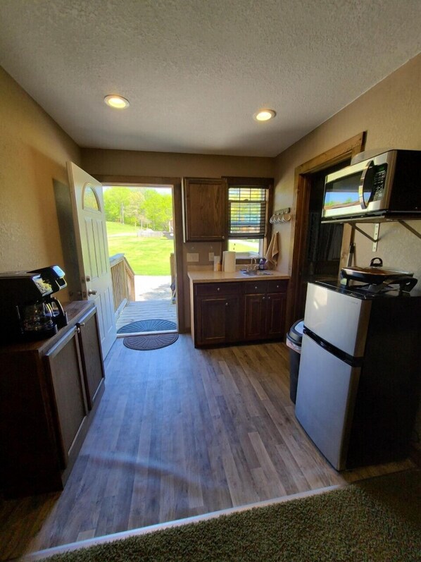 Fridge, microwave, coffee/tea maker, toaster