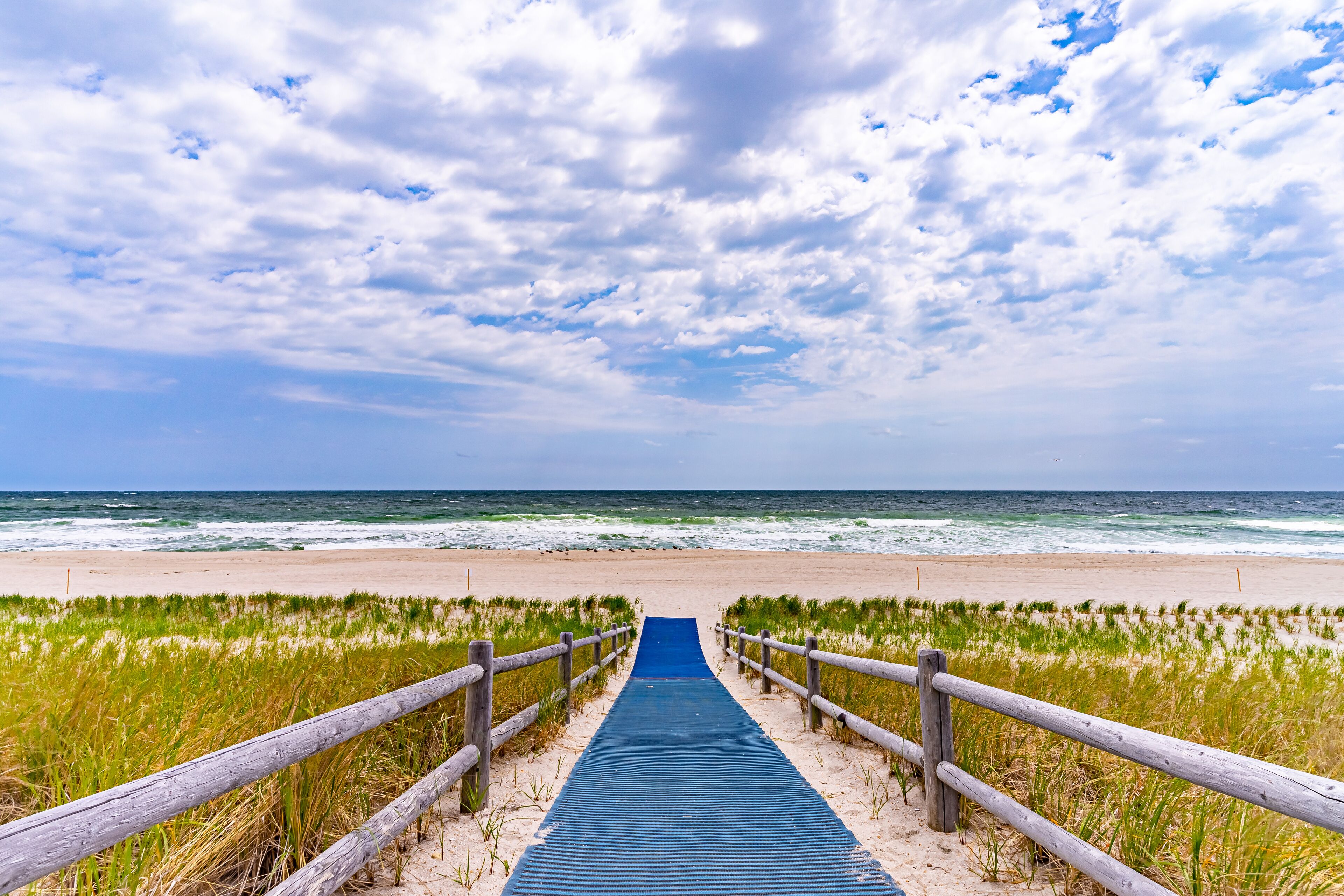 On the beach, sun loungers, beach towels