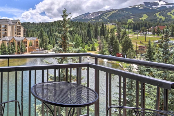 Balcony with bistro table and chairs