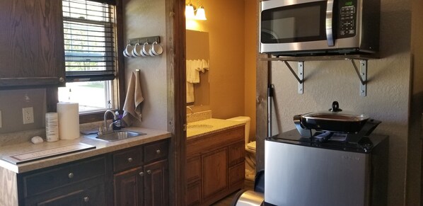 Fridge, microwave, coffee/tea maker, toaster