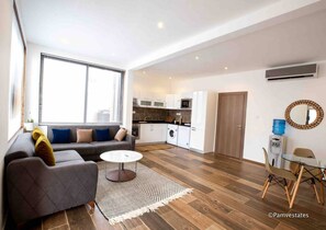 Apartment | Living room | 30-inch TV with digital channels - Beautiful 2-bed Apartment at Pamv Estates Apt7 (Santeo)