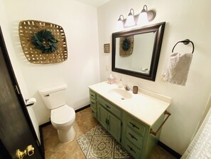 Combined shower/tub, hair dryer, towels, soap