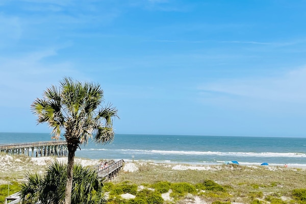 On the beach, sun loungers, beach towels