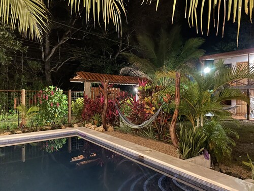 A rustic lodge surrounded by gardens, in a jungle setting - double Room 1