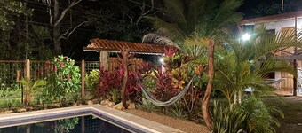 A rustic lodge surrounded by gardens, in a jungle setting - double Room 1