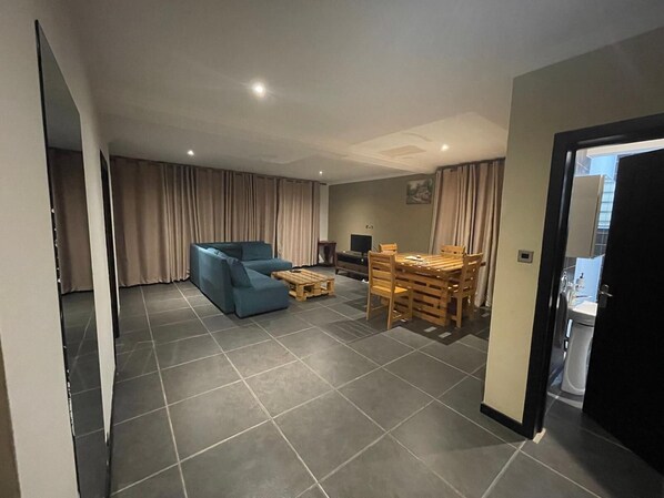Apartment | Living room | 30-inch TV with digital channels - Remarkable 2-bed Apartment in Accra (Accra)