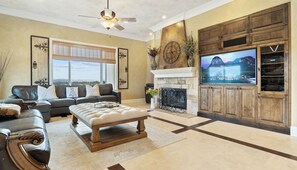 Smart TV, fireplace, books, offices