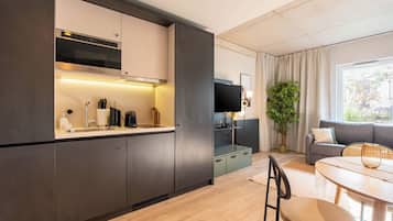 Suite with sofa bed | Private kitchen | Espresso maker, coffee/tea maker, electric kettle, paper towels