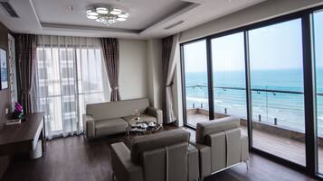Presidential Suite | Living room | 43-inch LCD TV with cable channels, TV