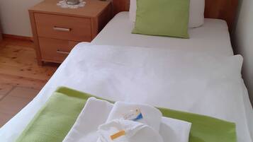 1 bedroom, travel crib, WiFi, bed sheets