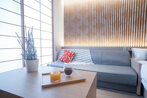 Deluxe twin with sofabed (Non smoking) | Living area | Flat-screen TV - ORI Kyoto Hotel (Kyoto)