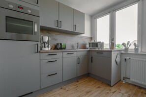 Fridge, microwave, oven, high chair