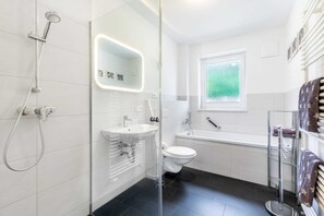 Shower, hair dryer, towels