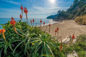 On the beach, sun-loungers, beach towels - Can Xirau Castle | Private Pool Sea Views Air Conditioning Ideal Families (SANTA SUSSANA)