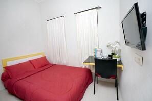 Deluxe kamer | Een bureau, gratis wifi, beddengoed