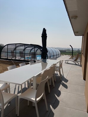 Outdoor dining - 14-person villa with sea view and heated indoor pool. (Lanmodez)