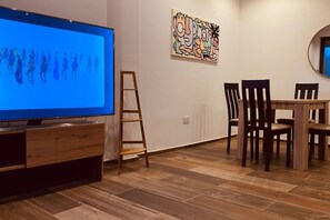 Apartment | Living area | 30-inch TV with digital channels