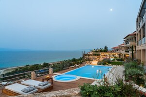 Seasonal outdoor pool, pool umbrellas, sun loungers