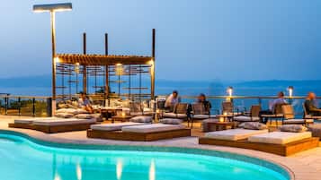 Seasonal outdoor pool, pool umbrellas, pool loungers