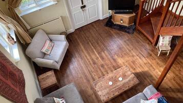 Casa de campo Premium | Área de sala de estar | Televisión de pantalla plana