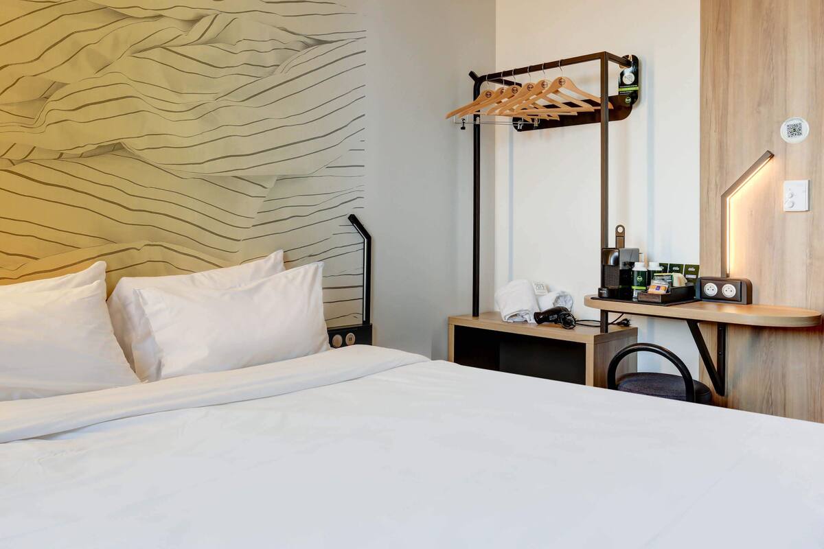 Desk, iron/ironing board (on request), WiFi (free), bed sheets