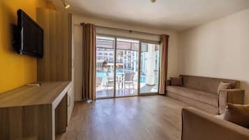 Familie appartement | Een minibar, een kluis op de kamer, gratis wifi, beddengoed