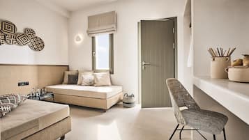 Deluxe Family Suite with Village View | 1 bedroom, premium bedding, in-room safe, individually decorated